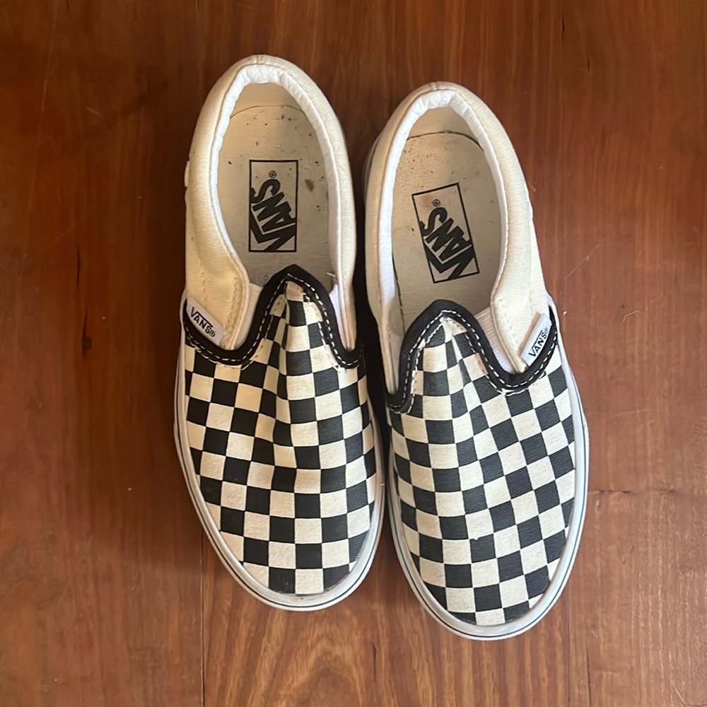 Checkered vans.